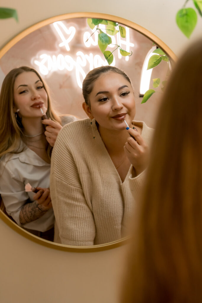 Darla and Brie in the mirror